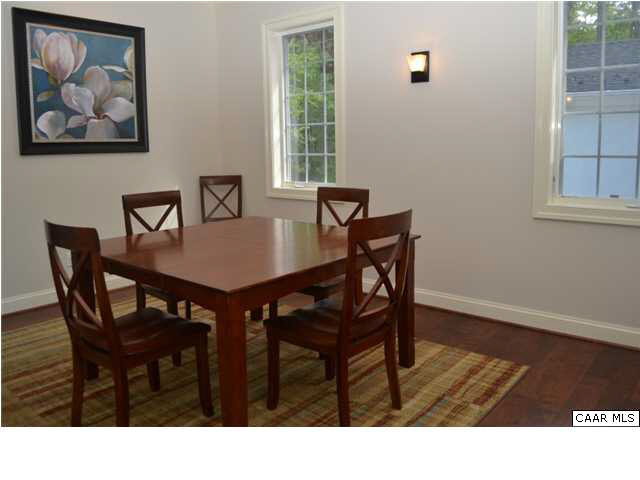 911 Tilman Road Charlottesville, VA 22901 - Photo 11 of 25 a black and white photo of a living room