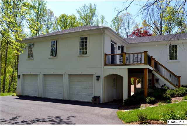 911 Tilman Road Charlottesville, VA 22901 - Photo 20 of 25 a front view of a house with a yard