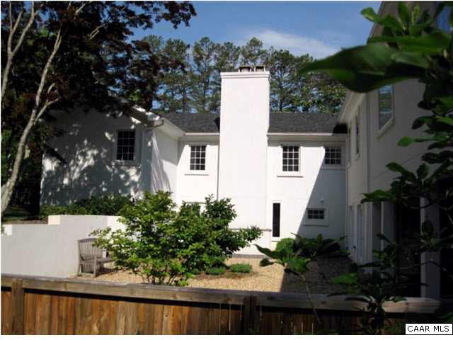 911 Tilman Road Charlottesville, VA 22901 - Photo 2 of 25 a view of a house with a yard and garden