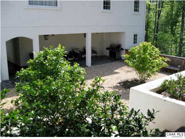 911 Tilman Road Charlottesville, VA 22901 - Photo 22 of 25 front view of a house with potted plants
