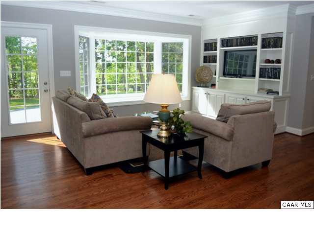 911 Tilman Road Charlottesville, VA 22901 - Photo 6 of 25 a living room with furniture and large windows
