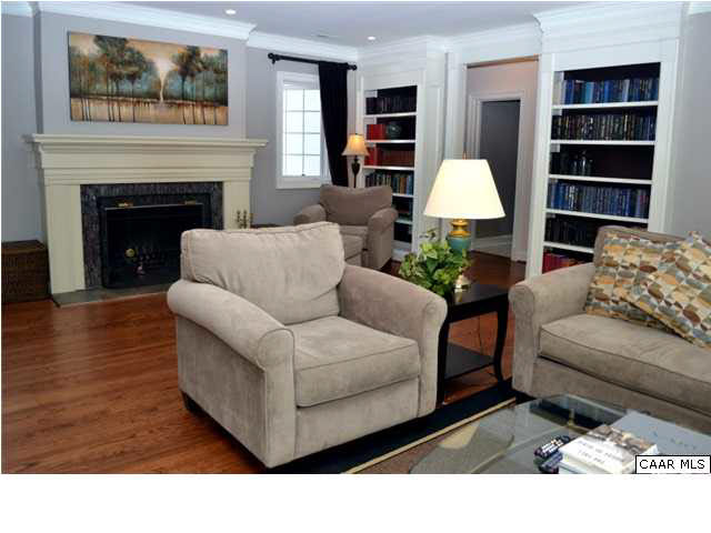 911 Tilman Road Charlottesville, VA 22901 - Photo 7 of 25 a living room with furniture and a fireplace