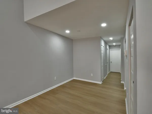 a workspace with furniture and wooden floor