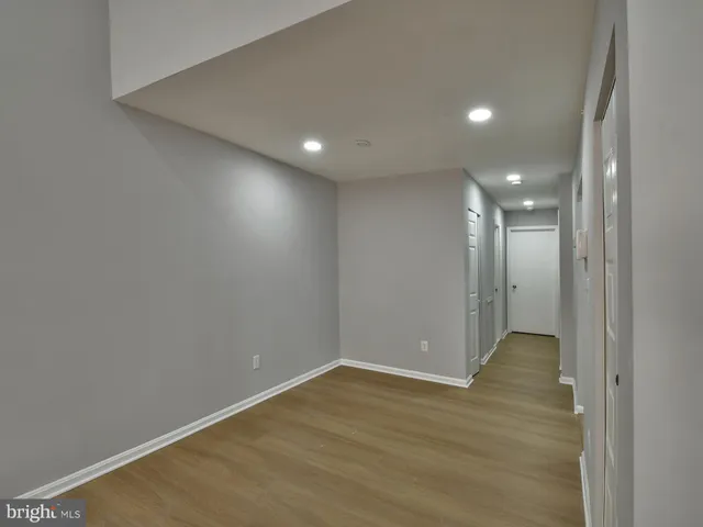 a workspace with furniture and wooden floor