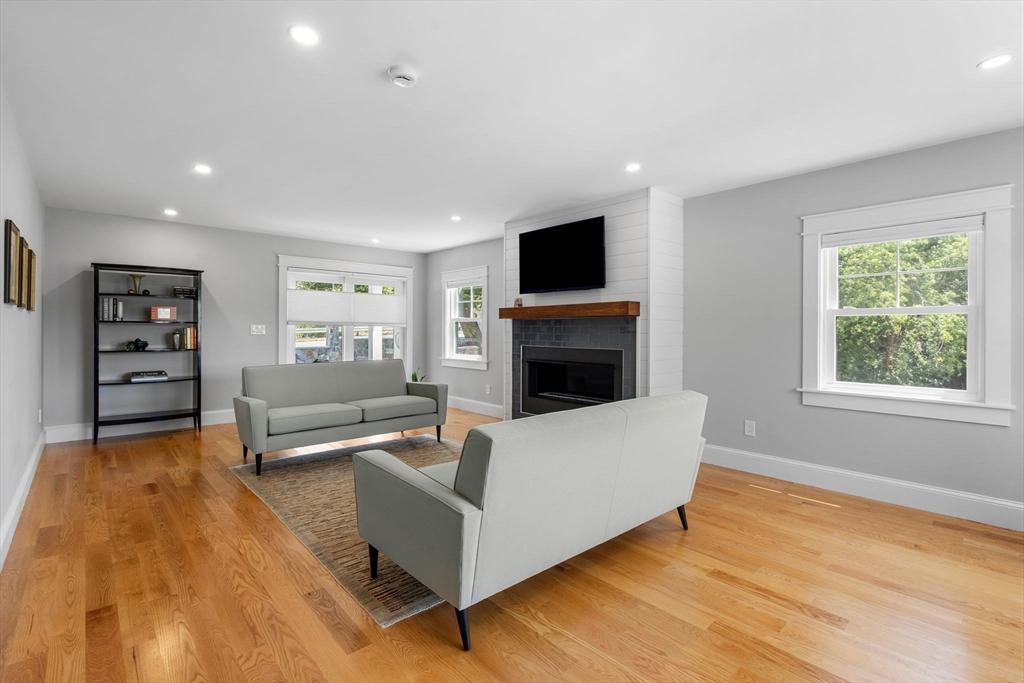 182 High Road Newbury, MA 01951 - Photo 12 of 42 a living room with furniture and a flat screen tv