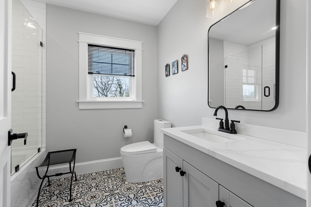 182 High Road Newbury, MA 01951 - Photo 27 of 42 a bathroom with a sink toilet and mirror