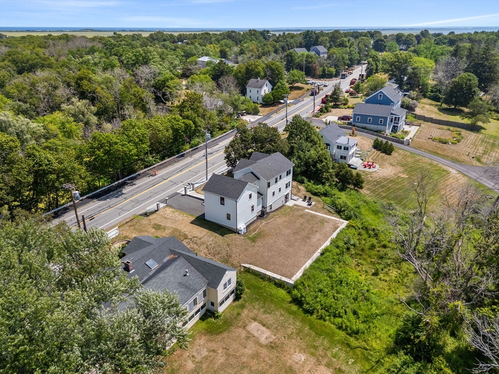 182 High Road Newbury, MA 01951 - Photo 38 of 42 an aerial view of a house with a yard