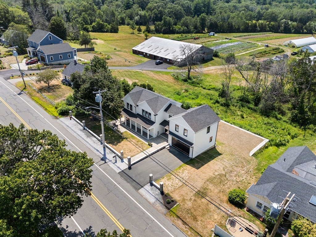 182 High Road Newbury, MA 01951 - Photo 40 of 42 an aerial view of a house with a garden