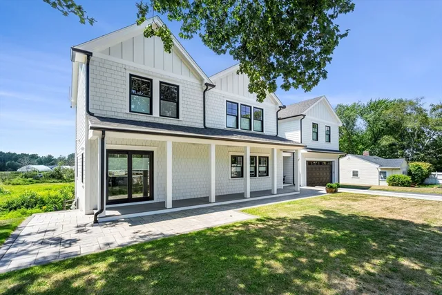 a house view with a garden space