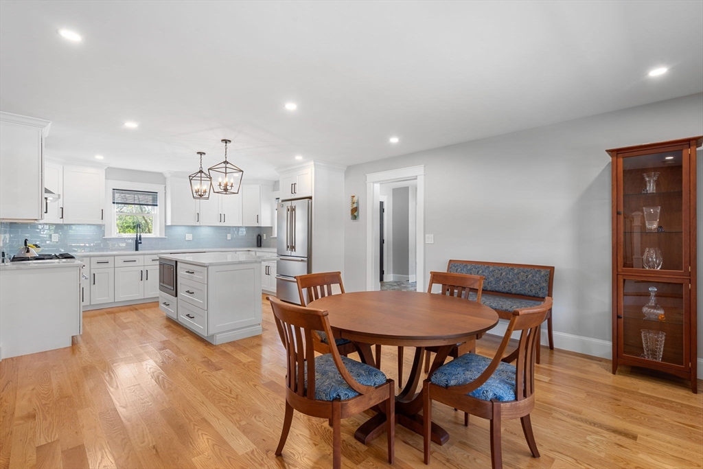 182 High Road Newbury, MA 01951 - Photo 7 of 42 a kitchen with a table and chairs in it