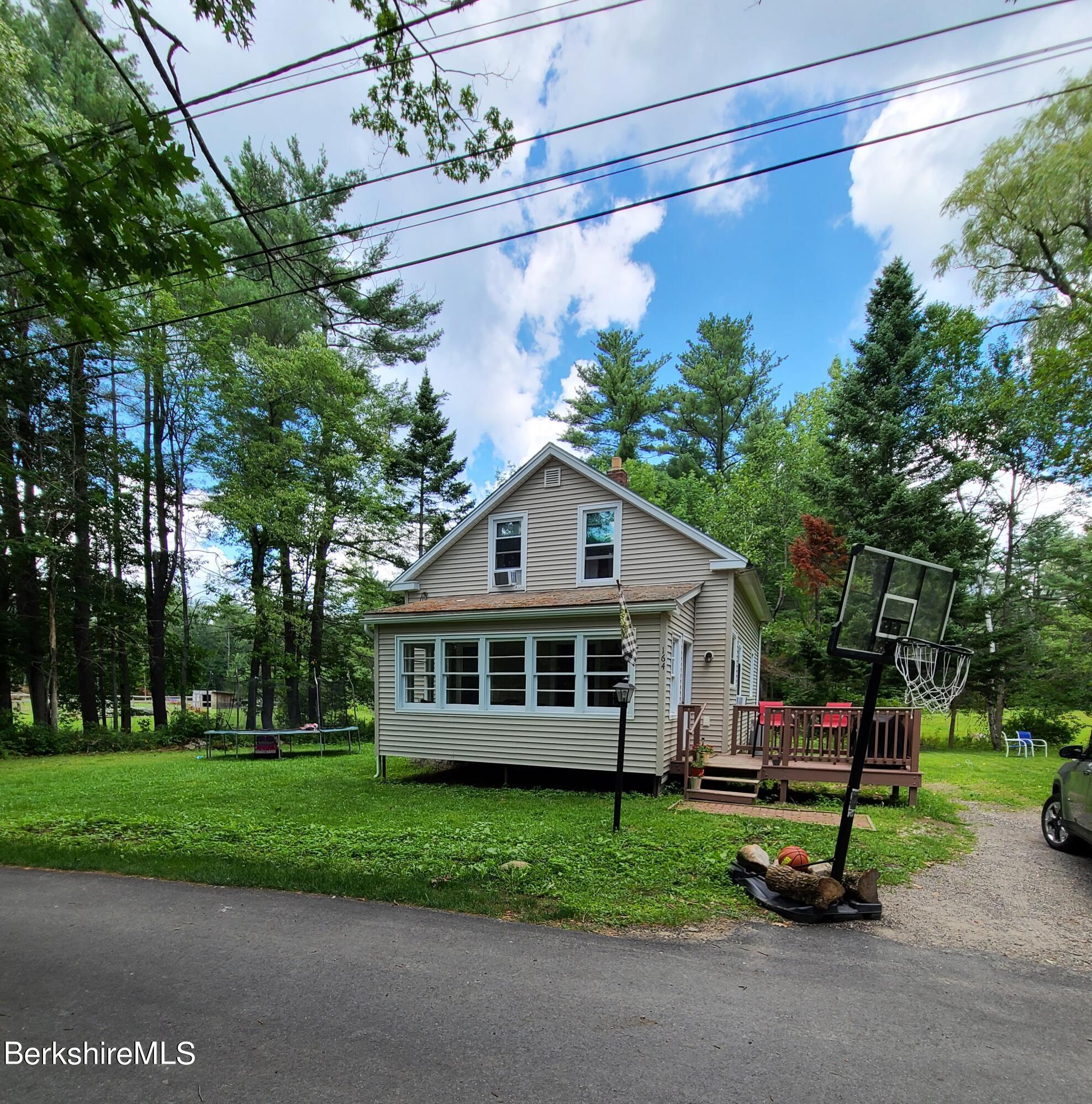 a house view with a garden space