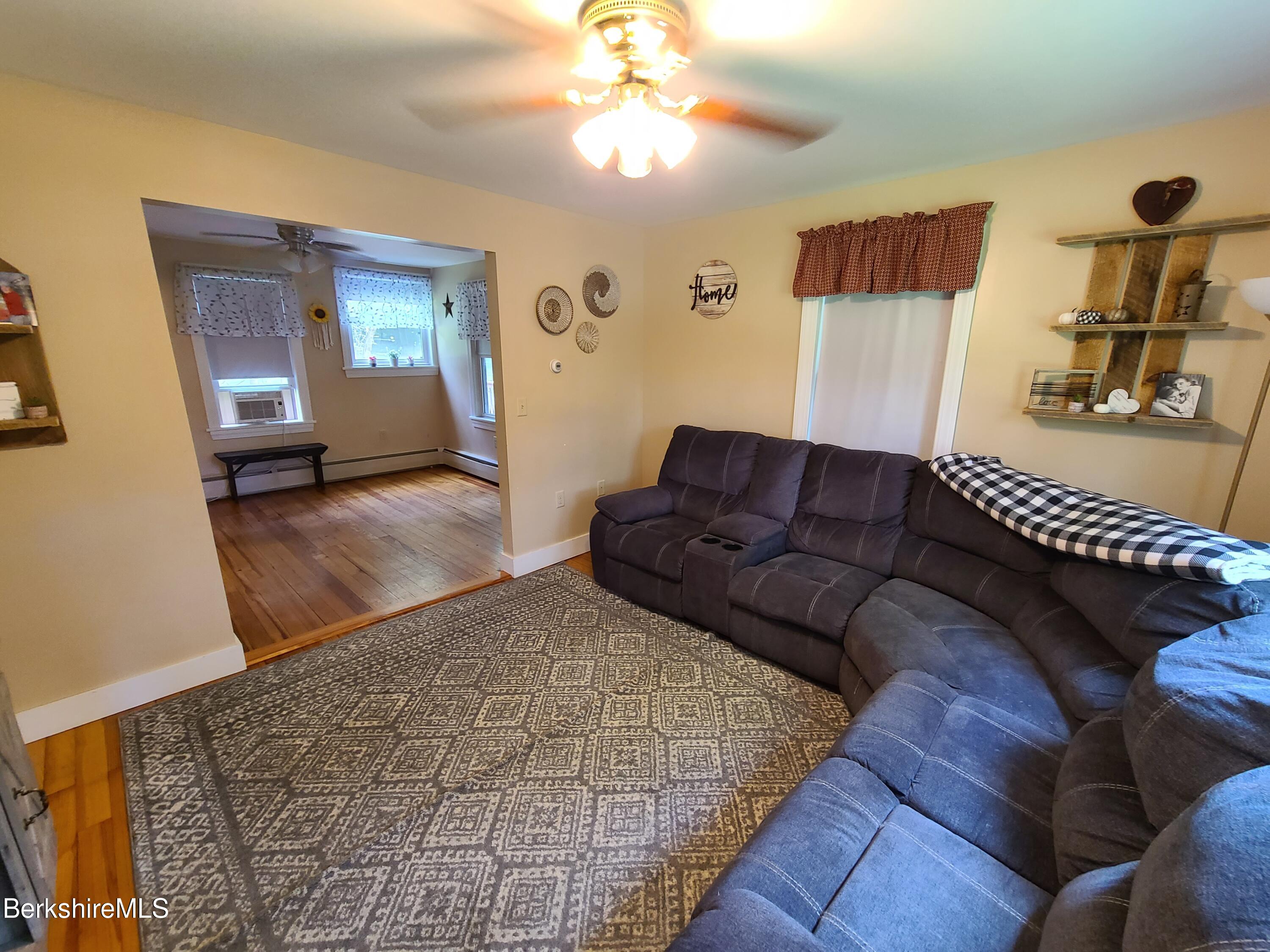 164 Cross Road Clarksburg, MA 01247 - Photo 11 of 22 a living room with furniture and a window