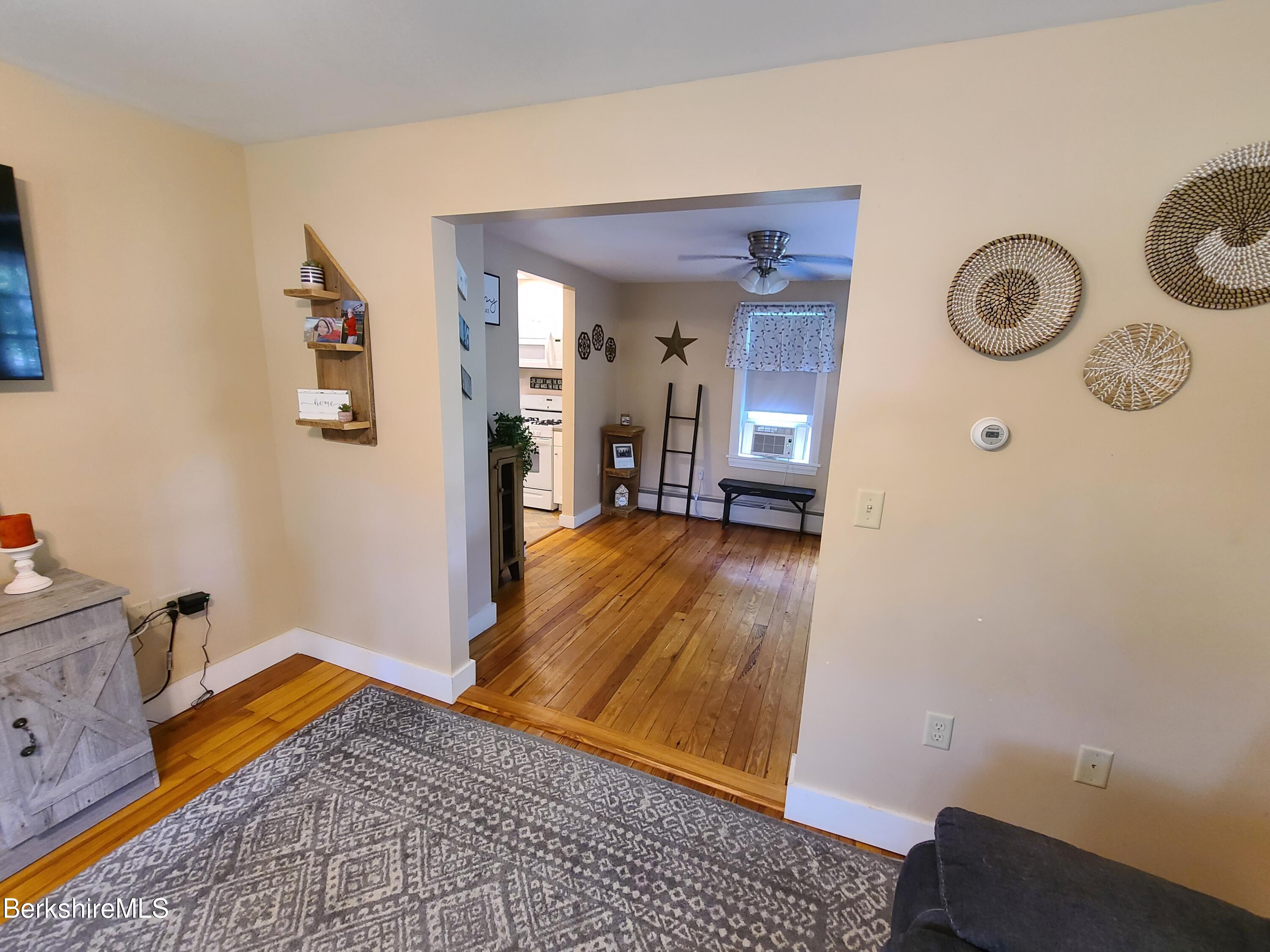 164 Cross Road Clarksburg, MA 01247 - Photo 12 of 22 a view of empty room with wooden floor