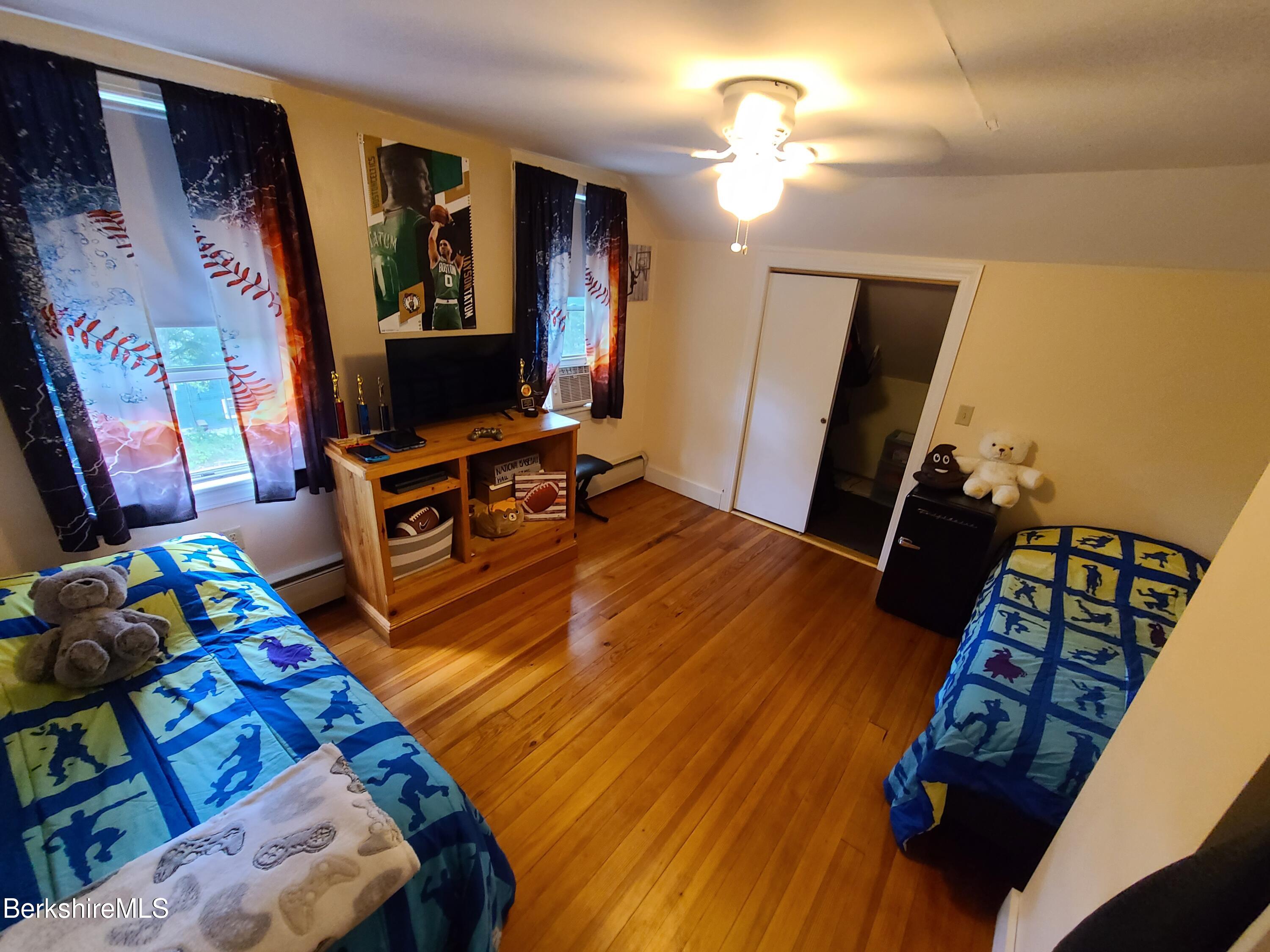 164 Cross Road Clarksburg, MA 01247 - Photo 13 of 22 a living room with furniture and a flat screen tv
