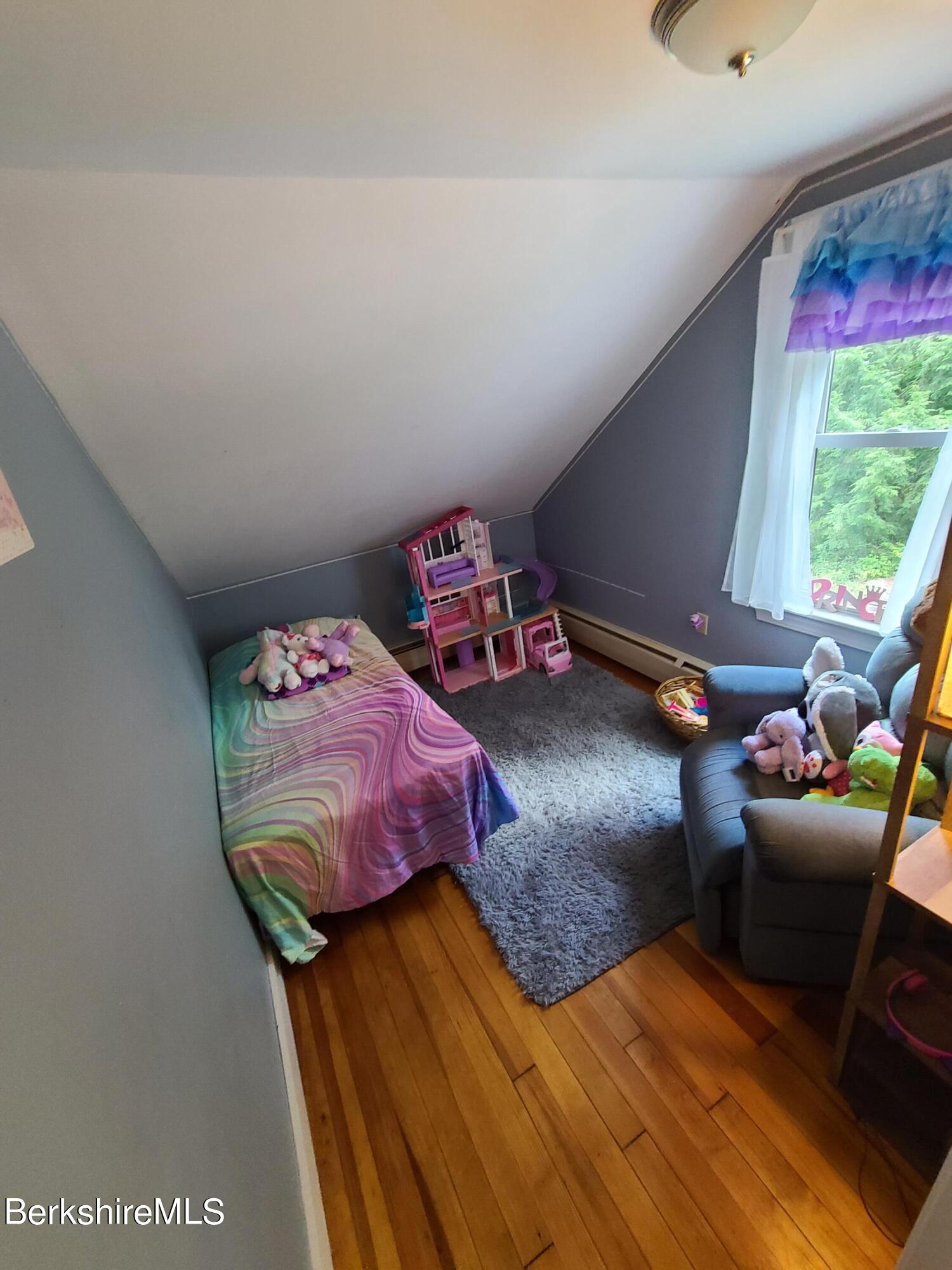 164 Cross Road Clarksburg, MA 01247 - Photo 15 of 22 a bedroom with a bed and a window