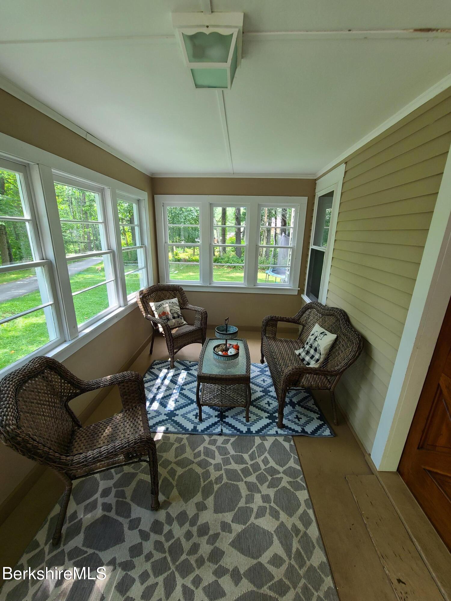 164 Cross Road Clarksburg, MA 01247 - Photo 2 of 22 a living room with furniture and a large window