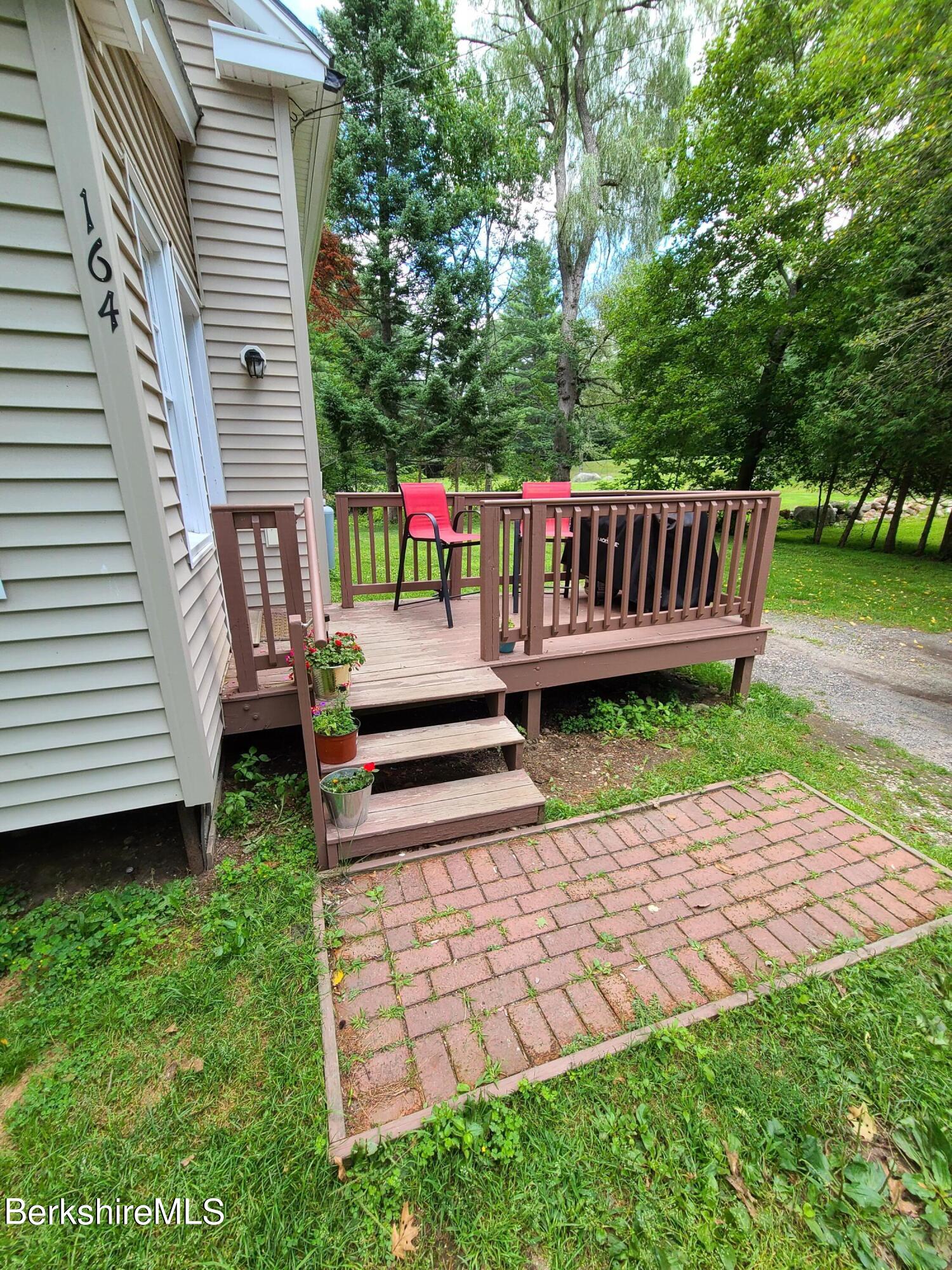 164 Cross Road Clarksburg, MA 01247 - Photo 22 of 22 a view of a wooden deck with a bench