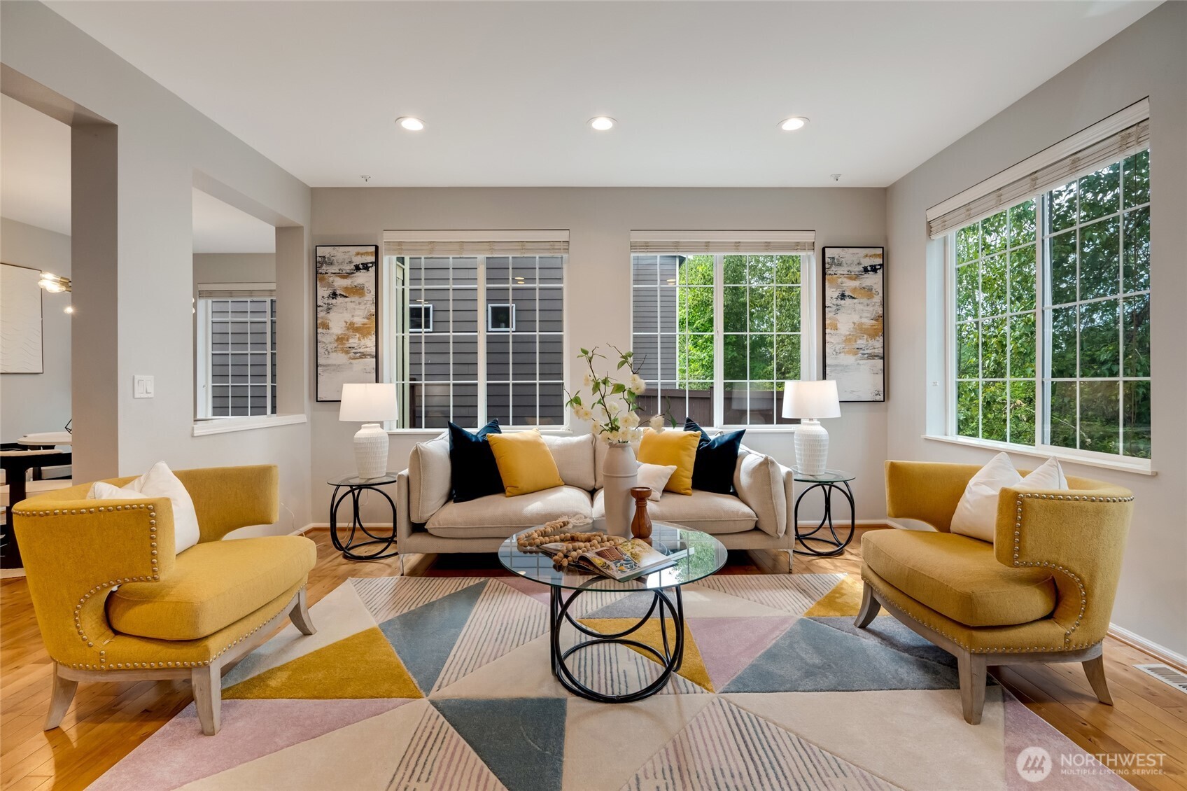 18307 38th Drive Southeast Bothell, WA 98012 - Photo 1 of 1 a living room with furniture and a large window