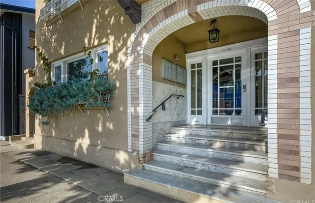 a front view of a house with a porch