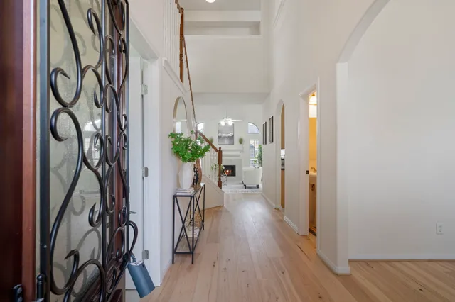 a view of entryway with wooden floor