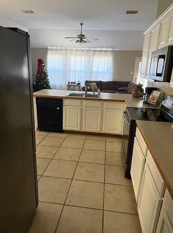 a bedroom with a bed and gym equipment