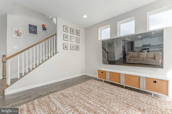 a kitchen with a sink window and cabinets