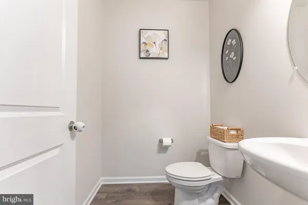 a spacious bathroom with a double vanity sink and a mirror