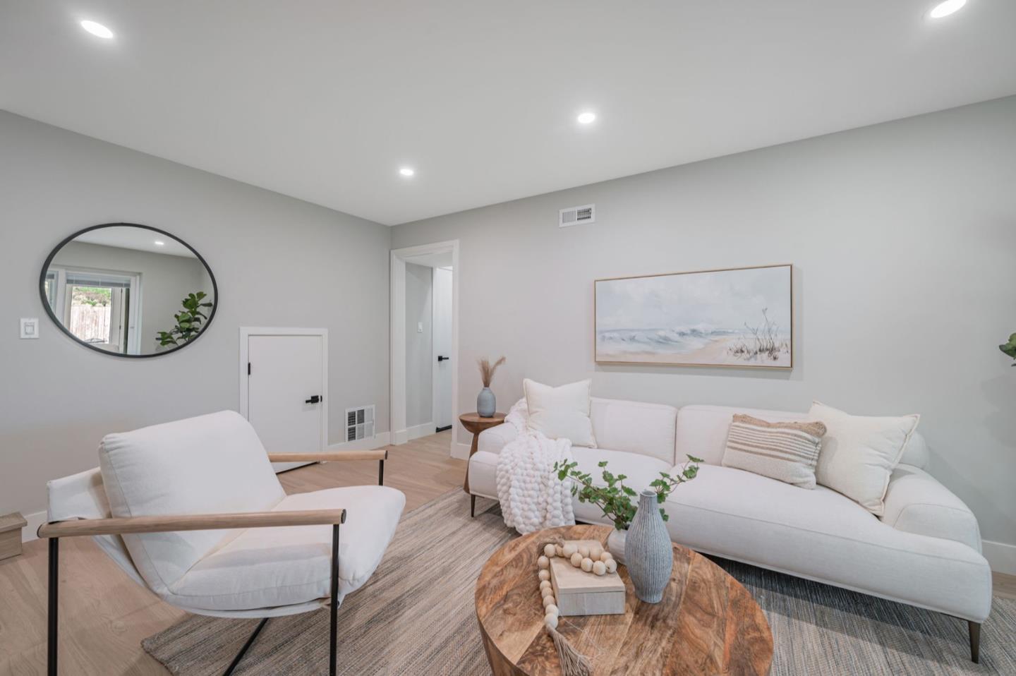 443 Andover Drive Pacifica, CA 94044 - Photo 11 of 56 a living room with furniture and a mirror