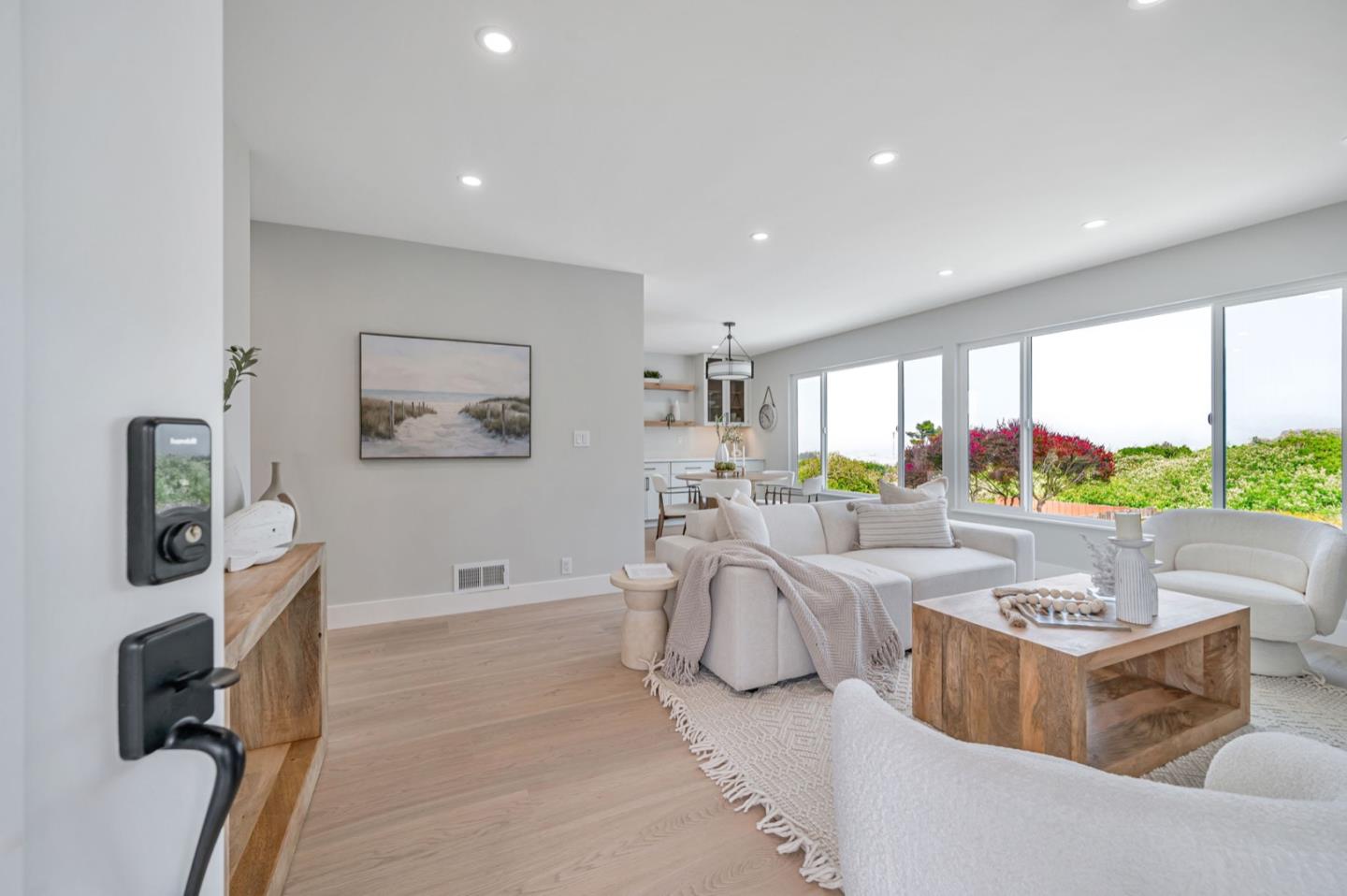 443 Andover Drive Pacifica, CA 94044 - Photo 2 of 56 a living room with furniture large window and a flat screen tv