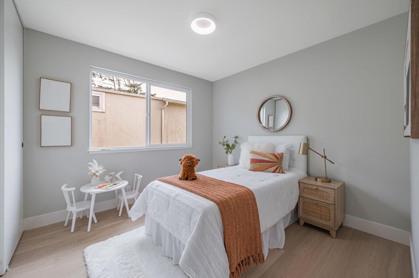 443 Andover Drive Pacifica, CA 94044 - Photo 21 of 56 a bedroom with a bed and window