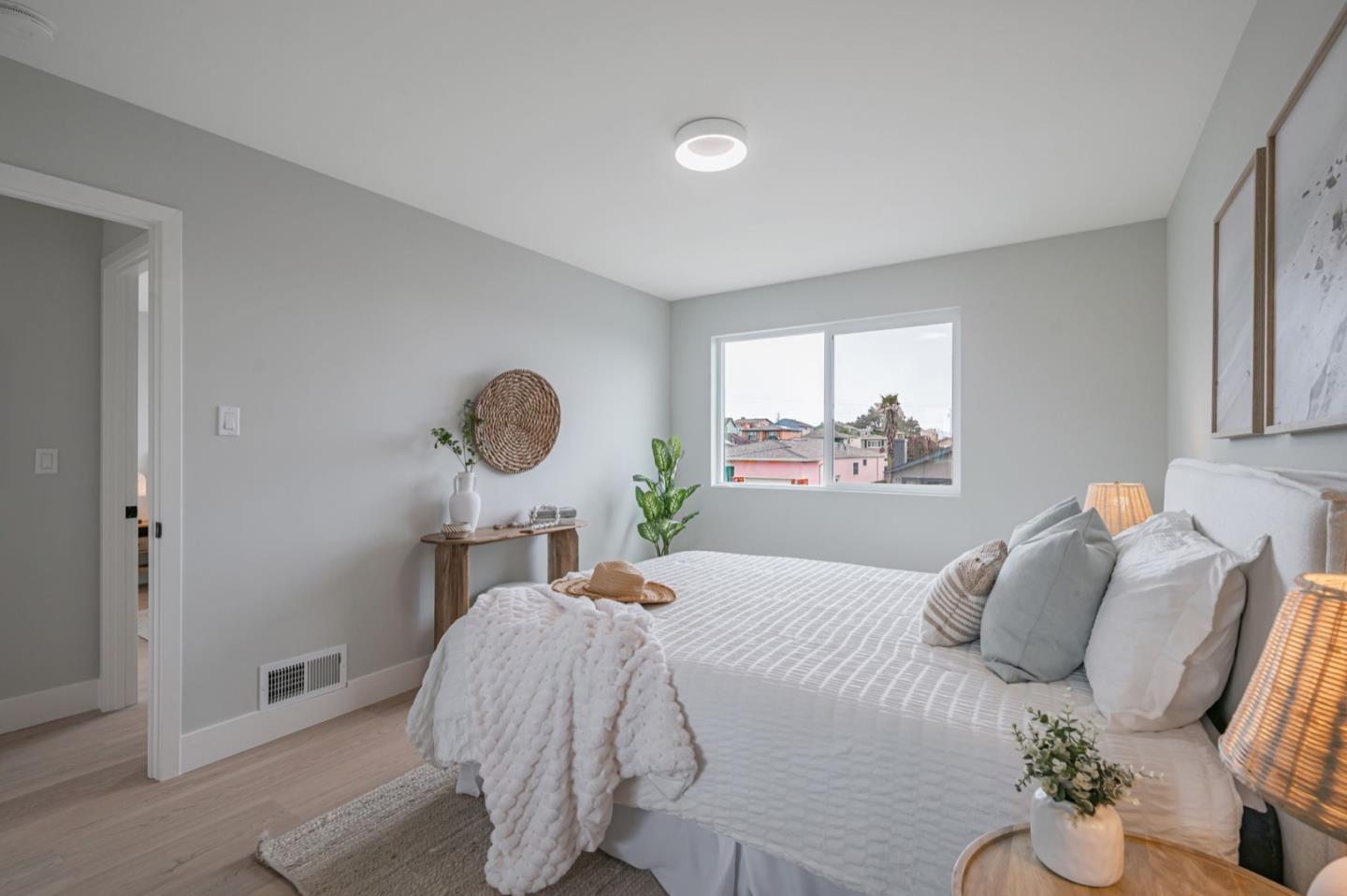 443 Andover Drive Pacifica, CA 94044 - Photo 25 of 56 a bedroom with a bed and a window