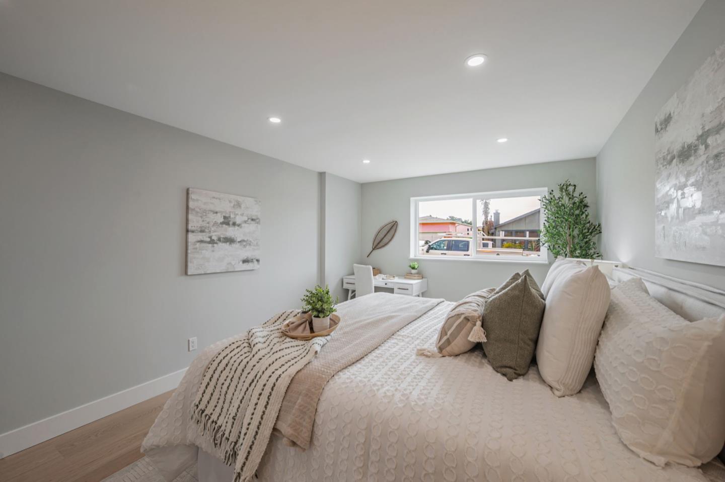 443 Andover Drive Pacifica, CA 94044 - Photo 30 of 56 a bedroom with a large bed and a window