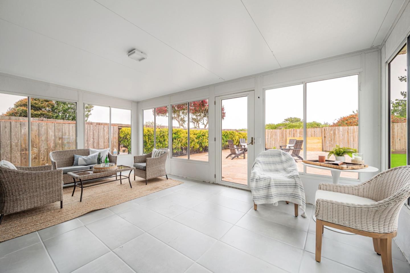 443 Andover Drive Pacifica, CA 94044 - Photo 37 of 56 a living room with furniture and a large window