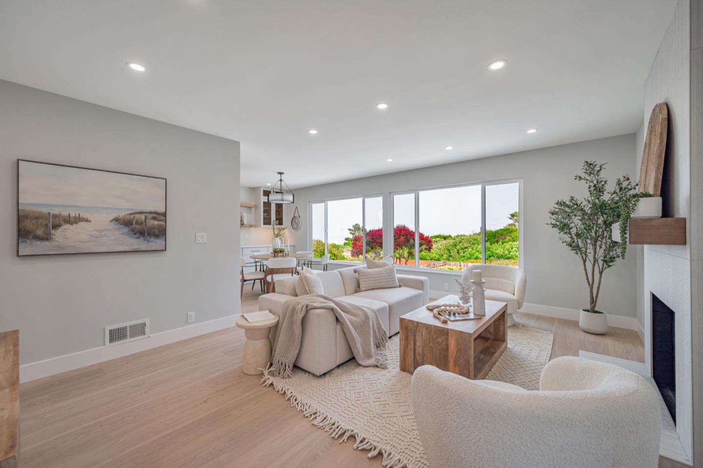 443 Andover Drive Pacifica, CA 94044 - Photo 4 of 56 a living room with furniture a potted plant and a flat screen tv