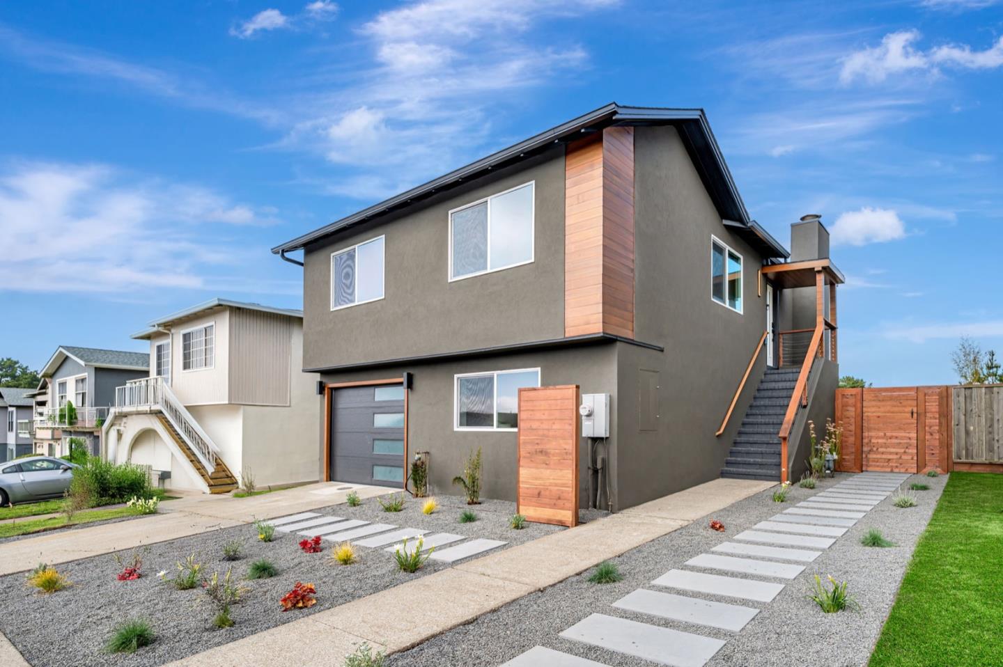 443 Andover Drive Pacifica, CA 94044 - Photo 45 of 56 a front view of a house with a yard