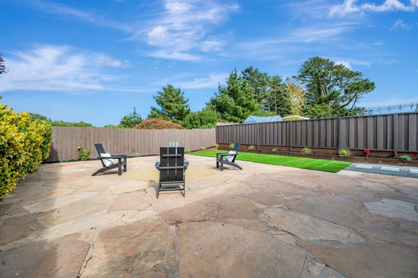443 Andover Drive Pacifica, CA 94044 - Photo 48 of 56 a view of a backyard with couches and table