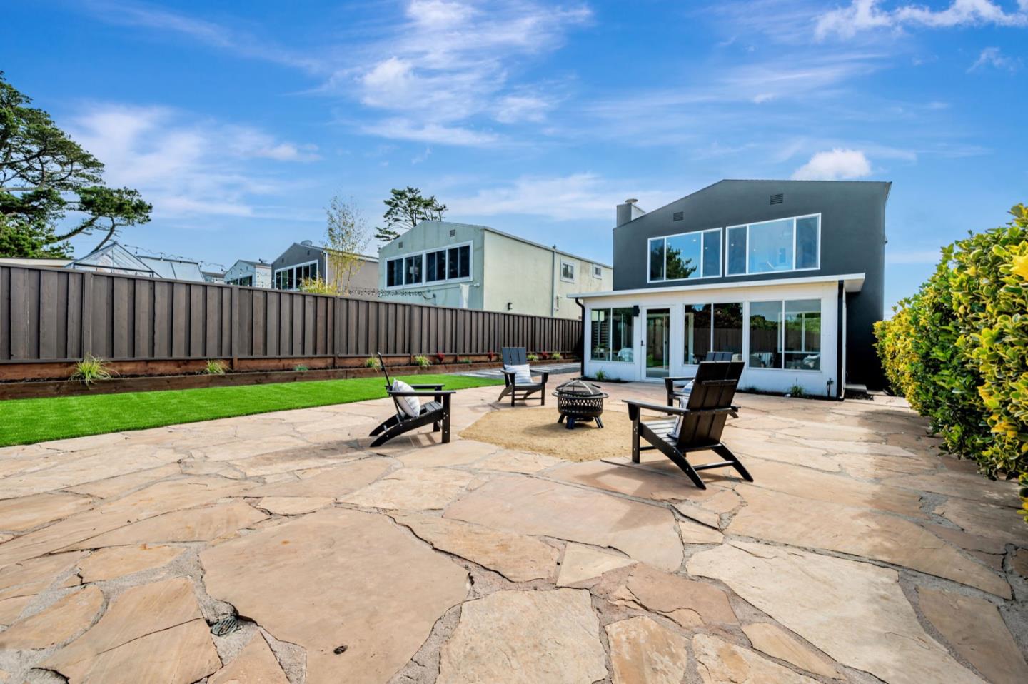 443 Andover Drive Pacifica, CA 94044 - Photo 49 of 56 a view of a house with backyard and sitting area