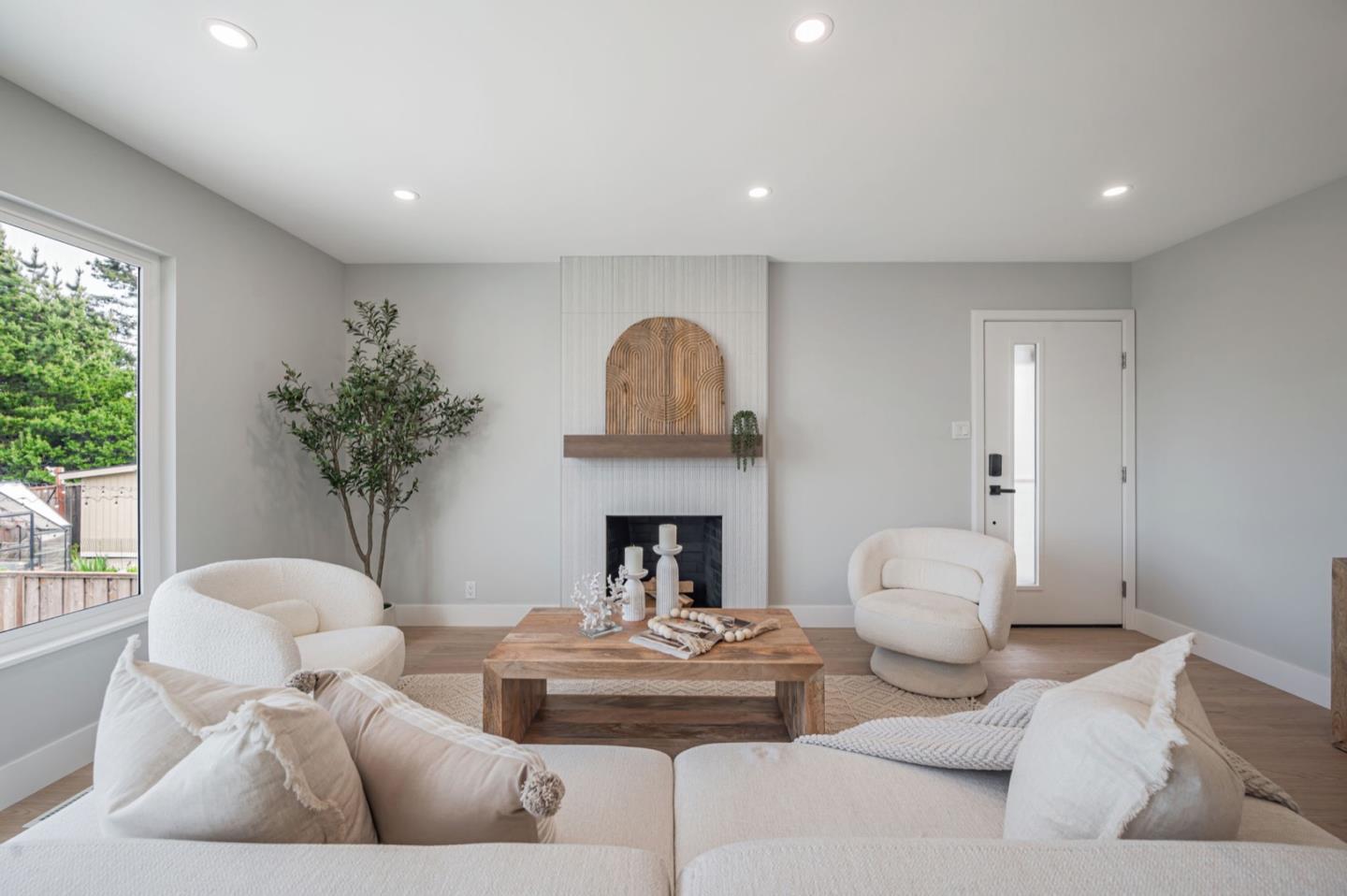 443 Andover Drive Pacifica, CA 94044 - Photo 5 of 56 a living room with furniture and a fireplace