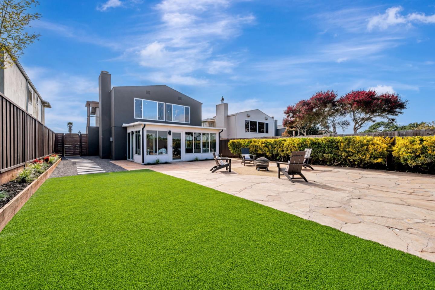 443 Andover Drive Pacifica, CA 94044 - Photo 52 of 56 a swimming pool with outdoor seating and yard