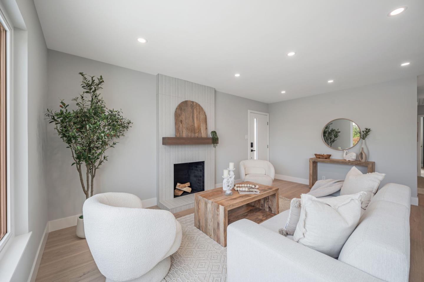 443 Andover Drive Pacifica, CA 94044 - Photo 6 of 56 a living room with furniture and a fireplace