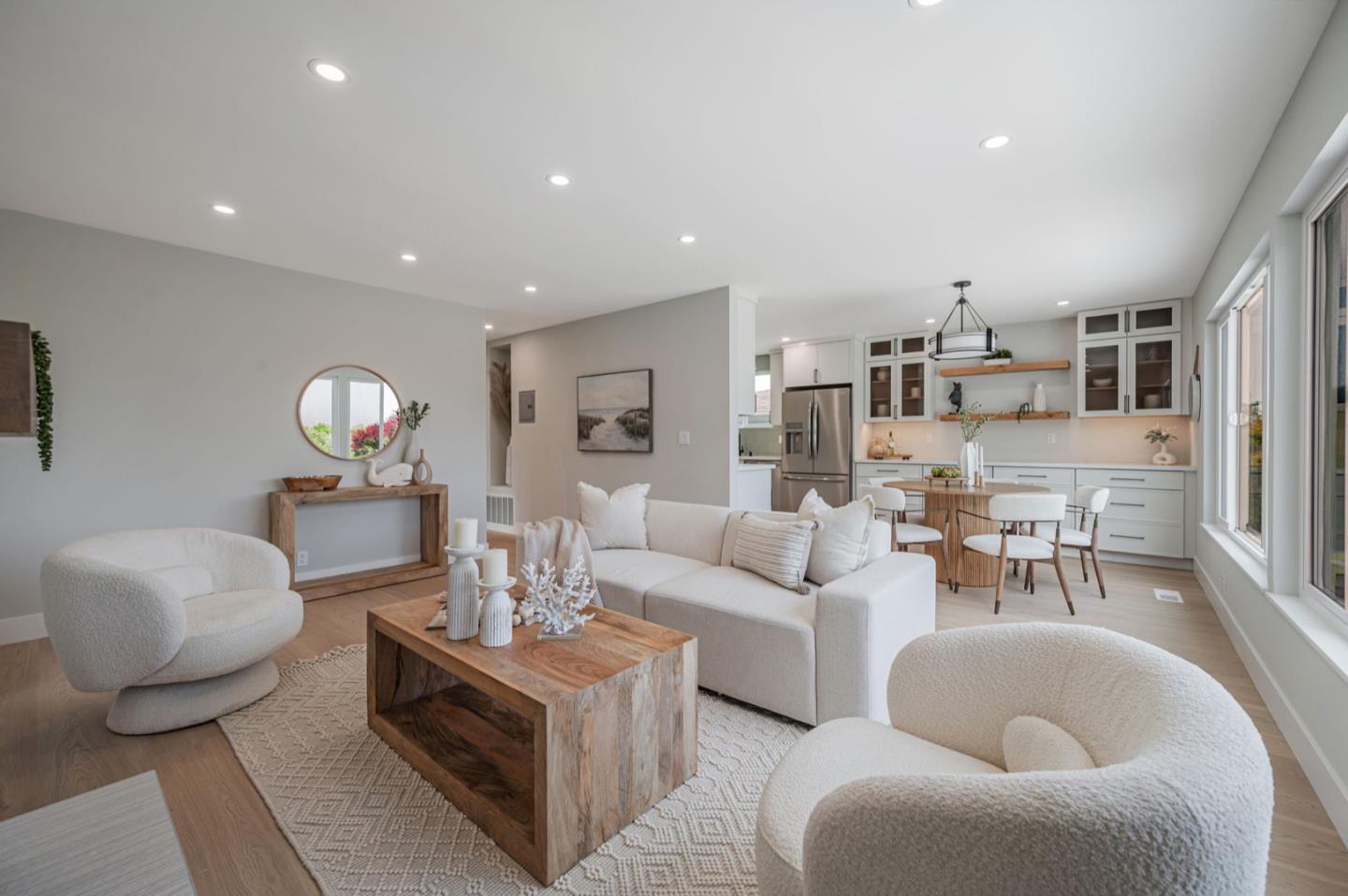 443 Andover Drive Pacifica, CA 94044 - Photo 7 of 56 a living room with furniture potted plant and white walls
