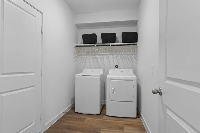 a utility room with dryer and washer