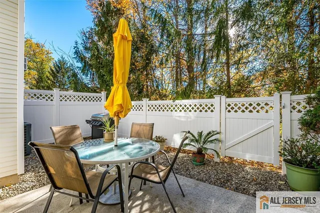 a view of a table and chairs in patio