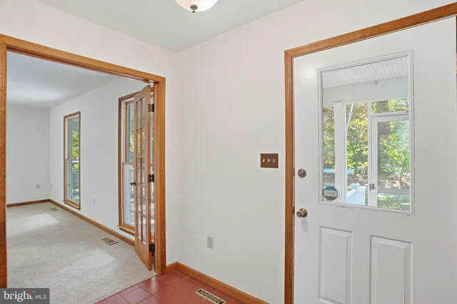 a view of livingroom with furniture wooden floor and windows