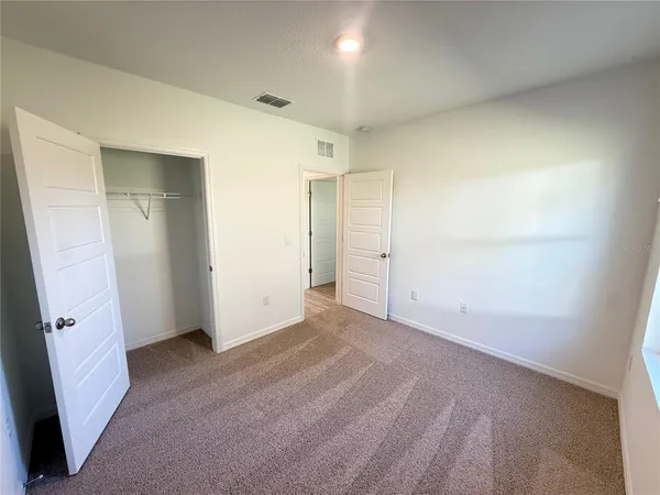 an empty room with a natural light