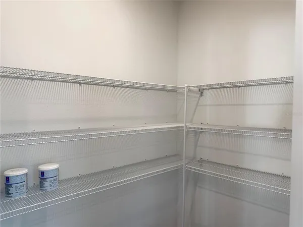 a view of an empty walk in closet