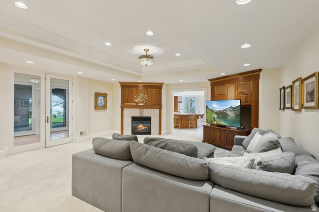 1714 Ridge Point Drive Bountiful, UT 84010 - Photo 72 of 132 Recessed lighting, wood-finish fireplace surround with a stone hearth, glass-paneled French doors, coffered ceiling, and built-in cabinetry