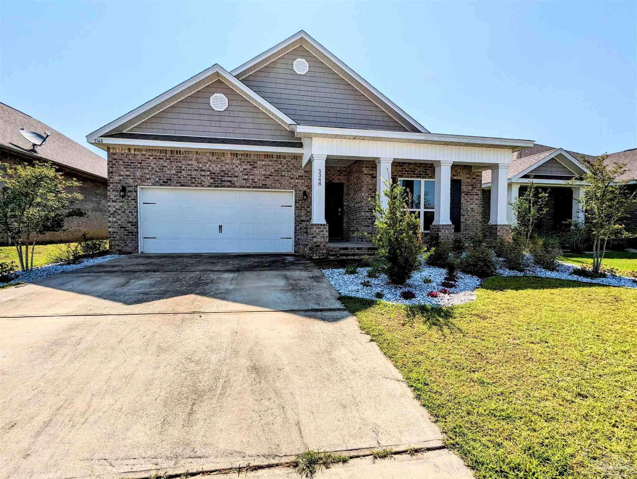 5348 Red Shoulder Road Pace, FL 32571 - Photo 1 of 39 a view of a house with sitting area