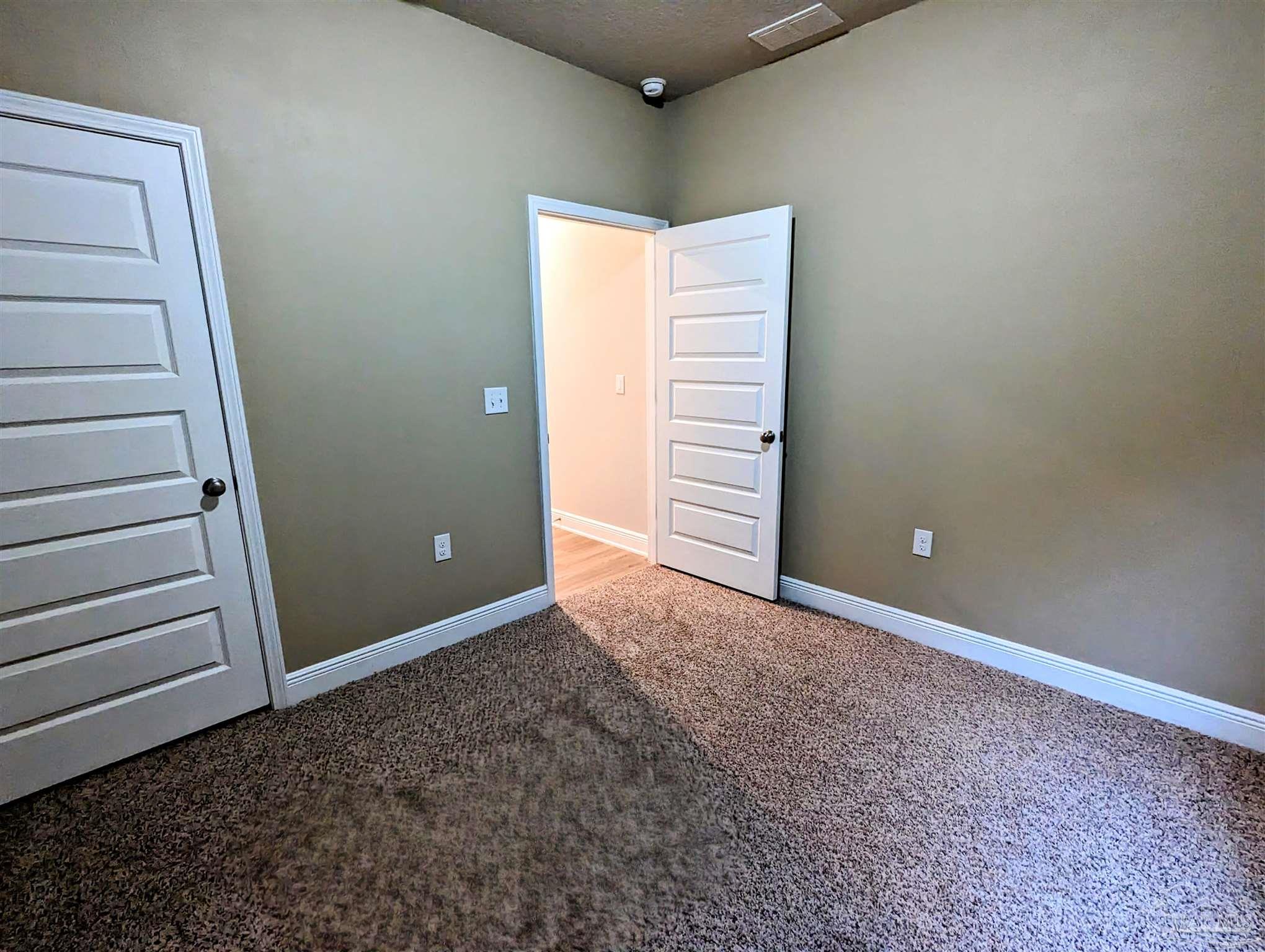 5348 Red Shoulder Road Pace, FL 32571 - Photo 16 of 39 a view of room with stairs