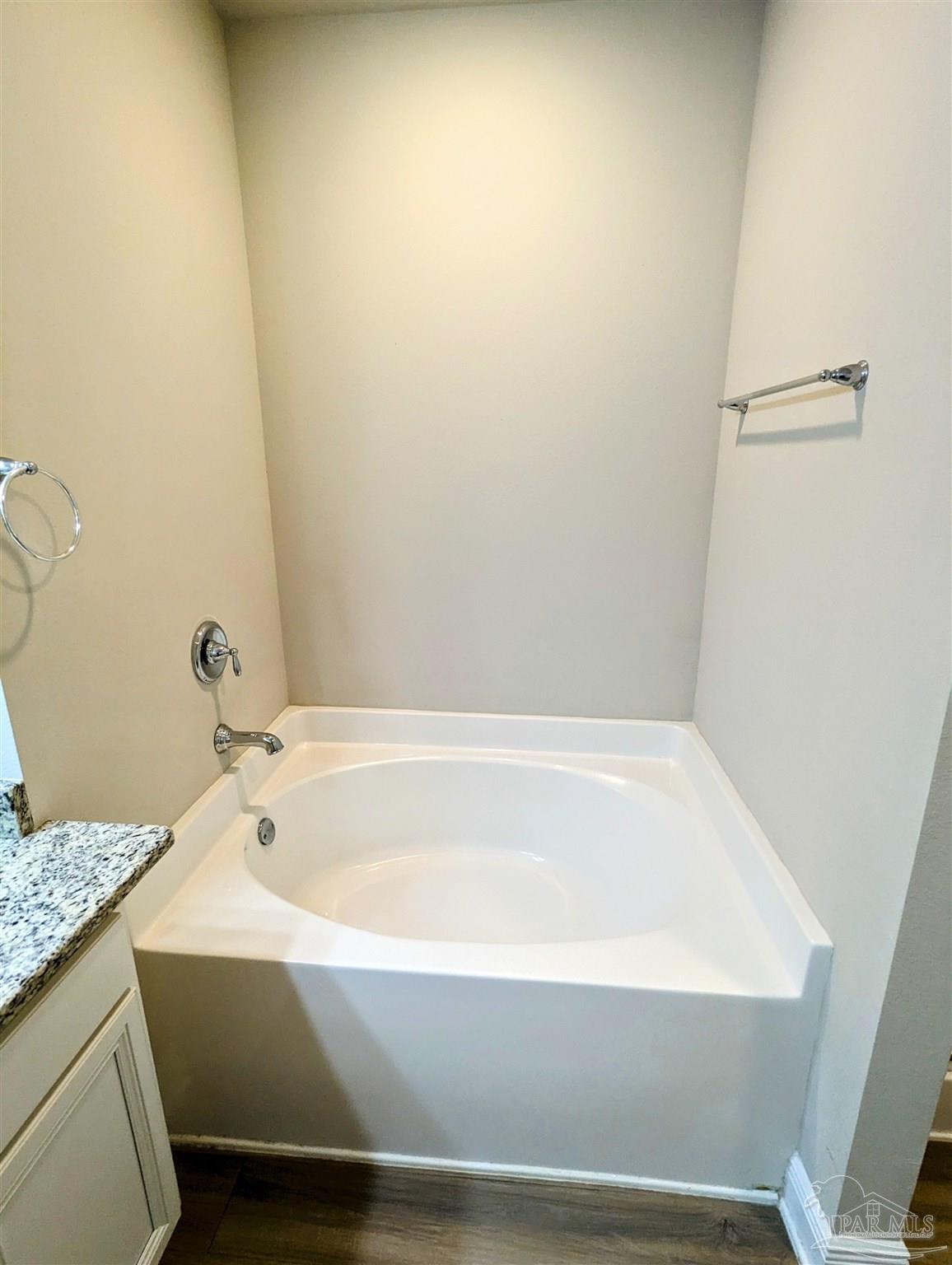 5348 Red Shoulder Road Pace, FL 32571 - Photo 36 of 39 a bathroom with a bathtub